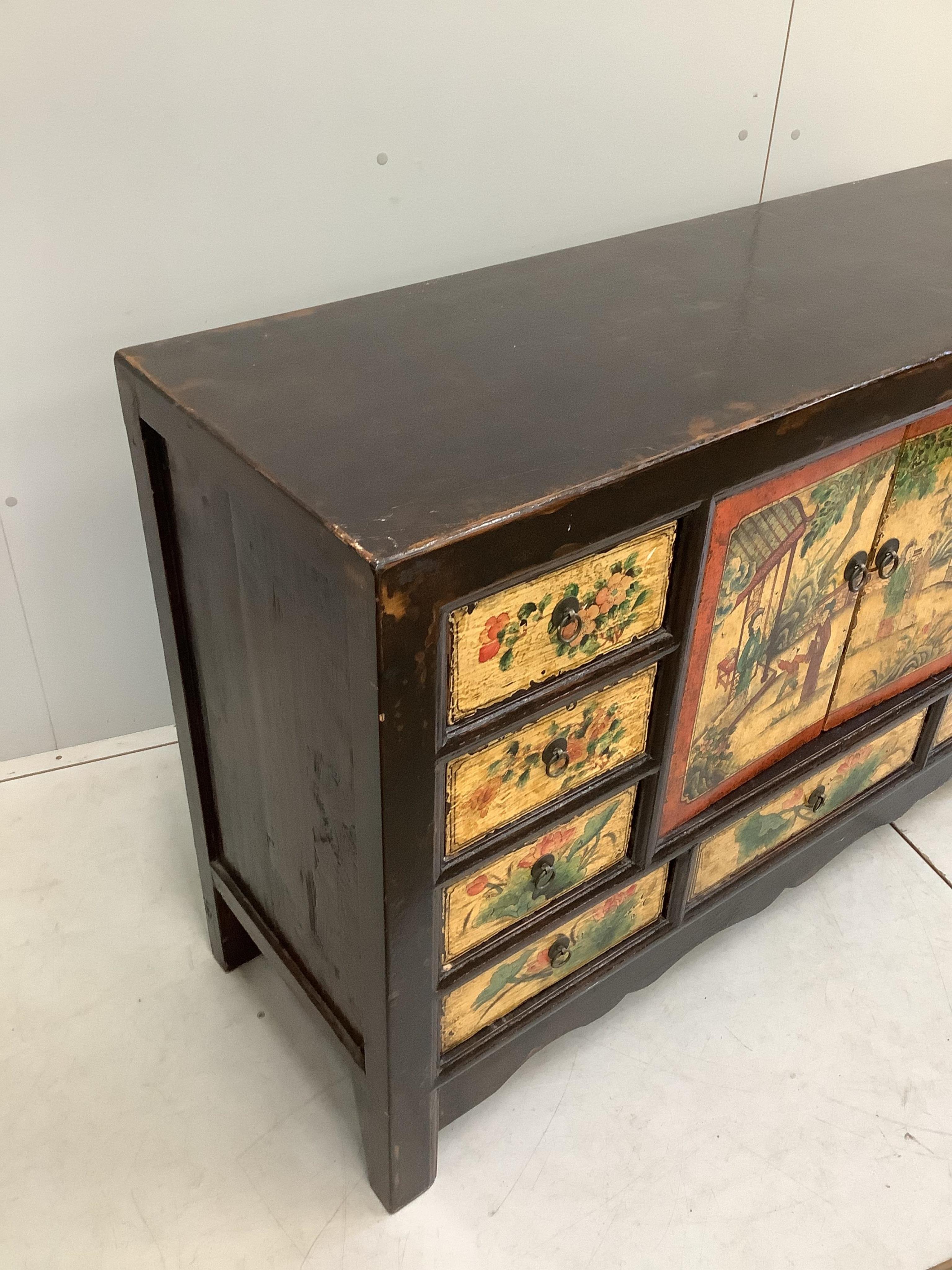 A small Chinese painted sideboard, width 132cm, depth 44cm, height 87cm